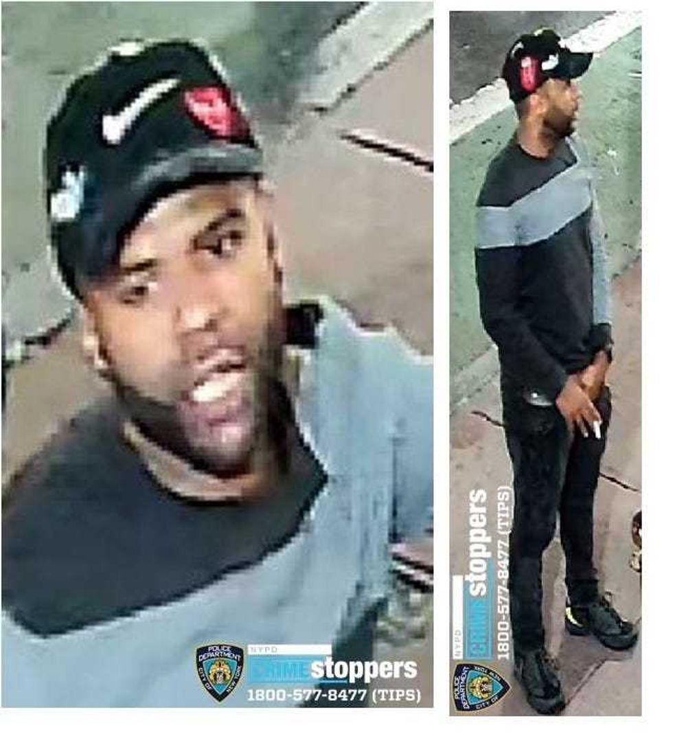 Security footage showing a man wanted for police questioning in connection to a homophobic attack on an E train early Saturday morning, July 31.