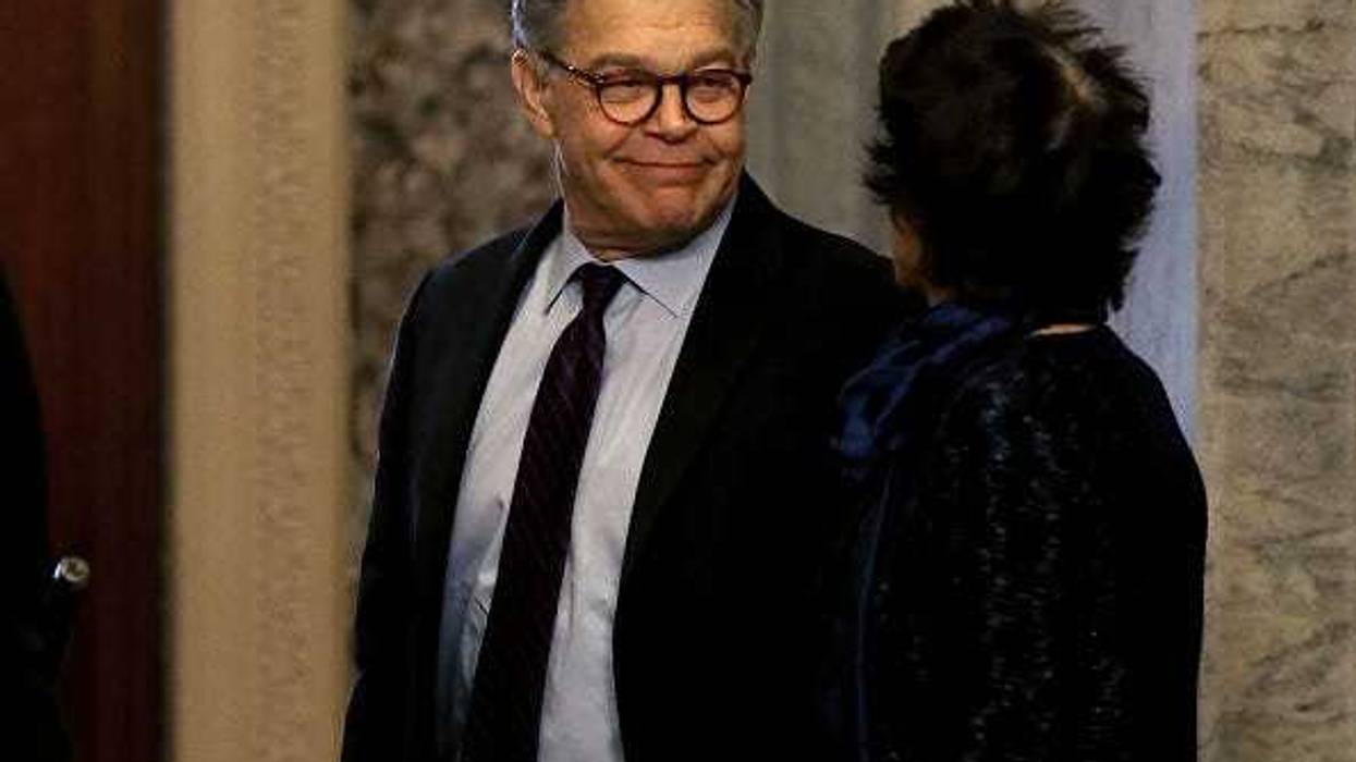Sen. Al Franken (D-MN) looks at his wife Franni Bryson, before walking to the Senate chamber to announce his resignation, Capitol Hill, on December 7, 2017 on Capitol Hill in Washington, DC. A growing number of Senate Democtratic's pressured Franken to resign amid claims of sexual harassment.