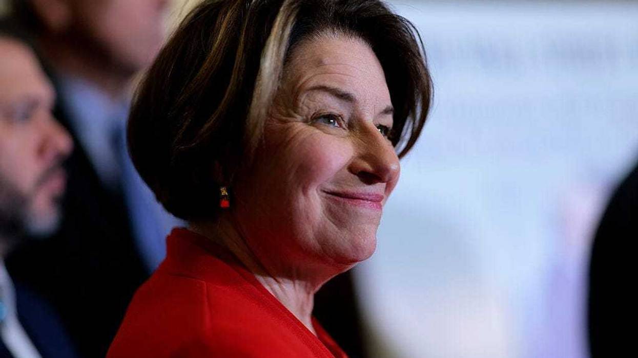 Sen. Amy Klobuchar (D-MN) attends a news conference with Senate Minority Leader Charles Schumer (D-NY) following the weekly Senate Democratic policy luncheon at the U.S. Capitol on November 19, 2025 in Washington, DC.