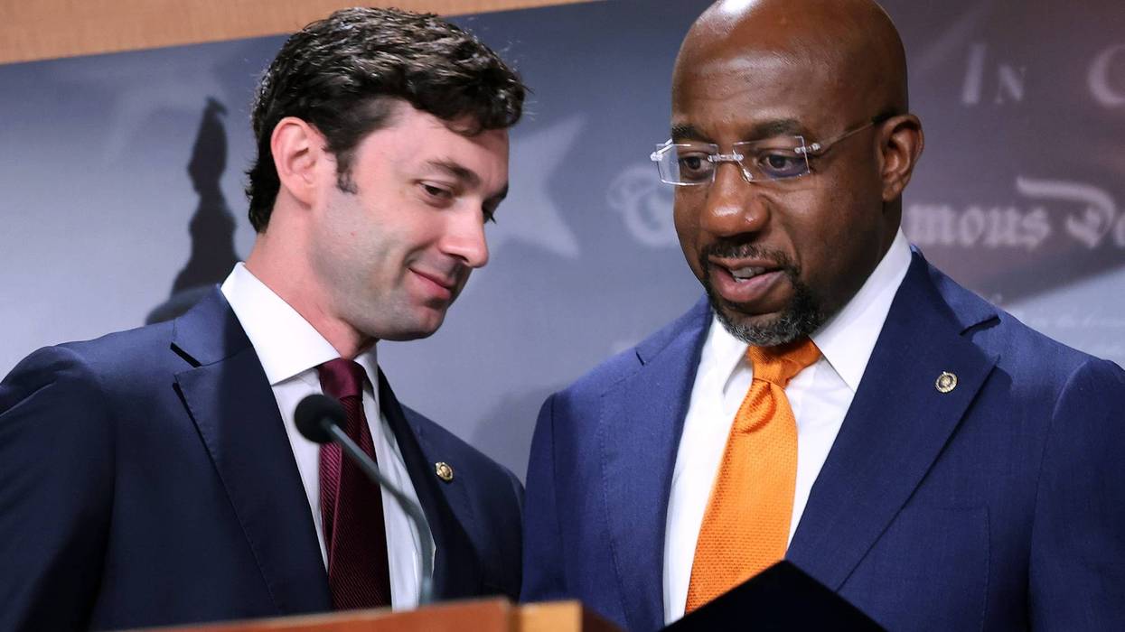 Sen. Jon Ossoff (D-GA) (L) and Sen. Raphael Warnock (D-GA) hold a news conference with fellow Democratic members of Congress to push for a solar tax credit at the U.S. Capitol on September 28, 2021 in Washington, D.C.