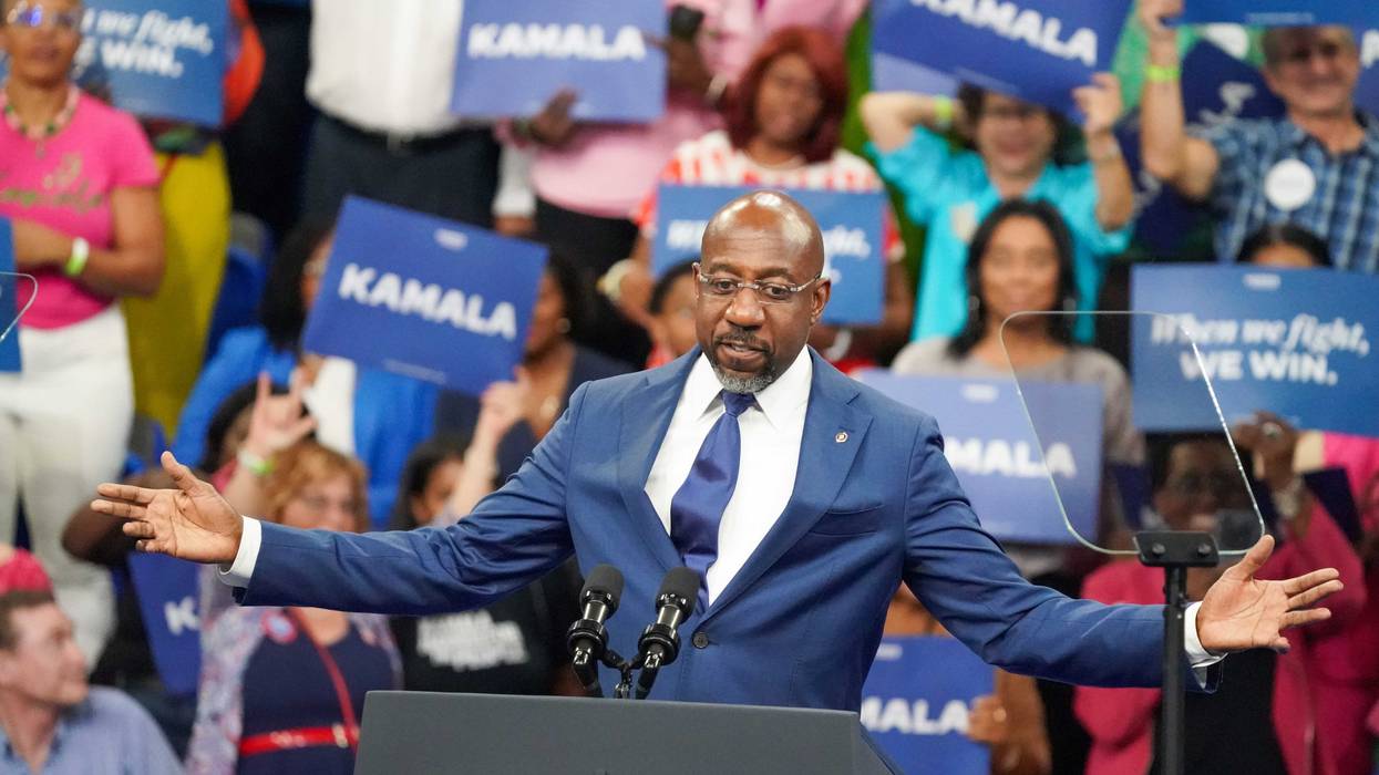 Sen. Raphael Warnock (D-Ga.) speaks onstage at a campaign rally for Democratic presidential candidate, U.S. Vice President Kamala Harris at the Georgia State Convocation Center on July 30, 2024, in Atlanta.