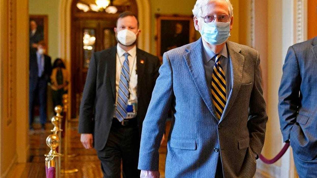 Senate Majority Leader Mitch McConnell of Ky., walks back to his office on Capitol Hill in Washington, Wednesday, Dec. 30, 2020. (AP Photo/Susan Walsh)