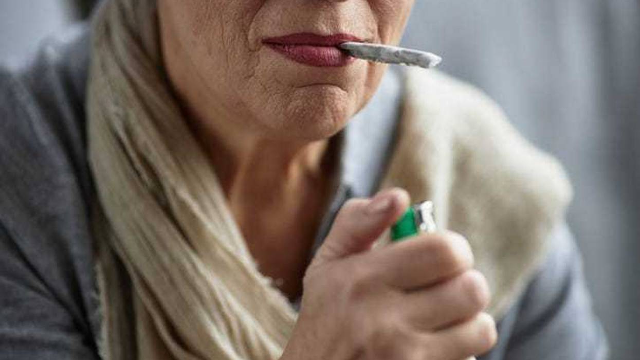 senior smoking a joint