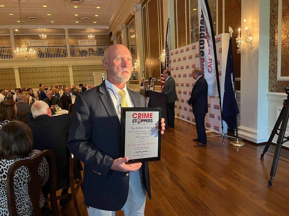 Senior Special Agent Eldon McCraw, Jr. receiving the SHIELD Award