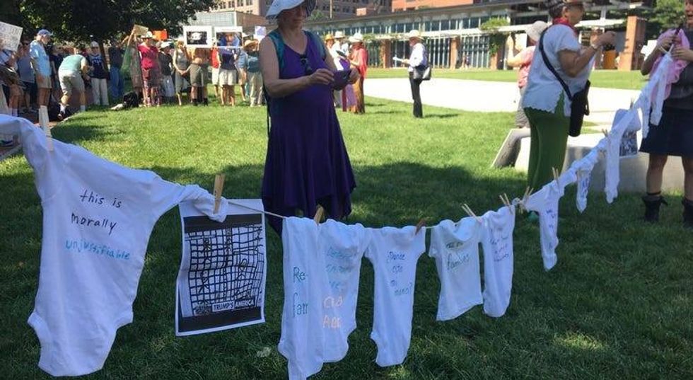 Seniors protest US treatment of migrant kids by 'caging' themselves in excessive heat