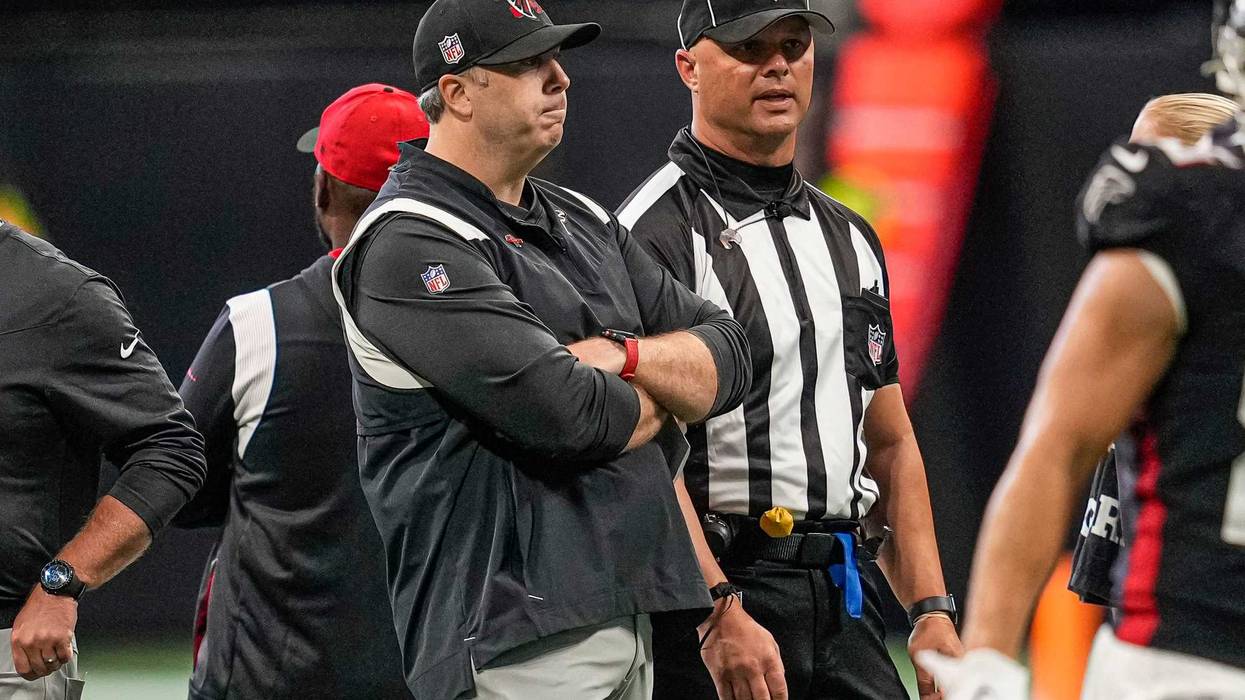 Sep 11, 2022; Atlanta, Georgia, USA; Atlanta Falcons head coach Arthur Smith talks with an official on the field prior to the game against the New Orleans Saints at Mercedes-Benz Stadium.