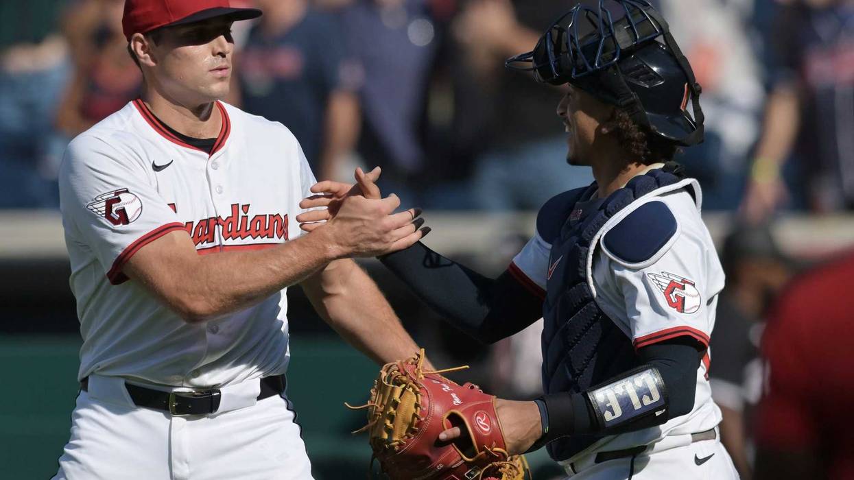 Sep 14, 2025; Cleveland, Ohio, USA; Cleveland Guardians relief pitcher Cade Smith (36) and catcher Bo Naylor (23) celebrate after the Guardians beat the Chicago White Sox at Progressive Field.