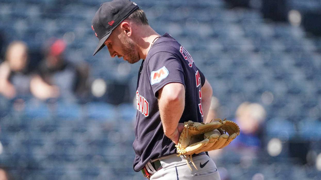 Sep 18, 2023; Kansas City, Missouri, USA; Cleveland Guardians relief pitcher Trevor Stephan (37) reacts after walking in a run against the Kansas City Royals in the eighth inning at Kauffman Stadium.