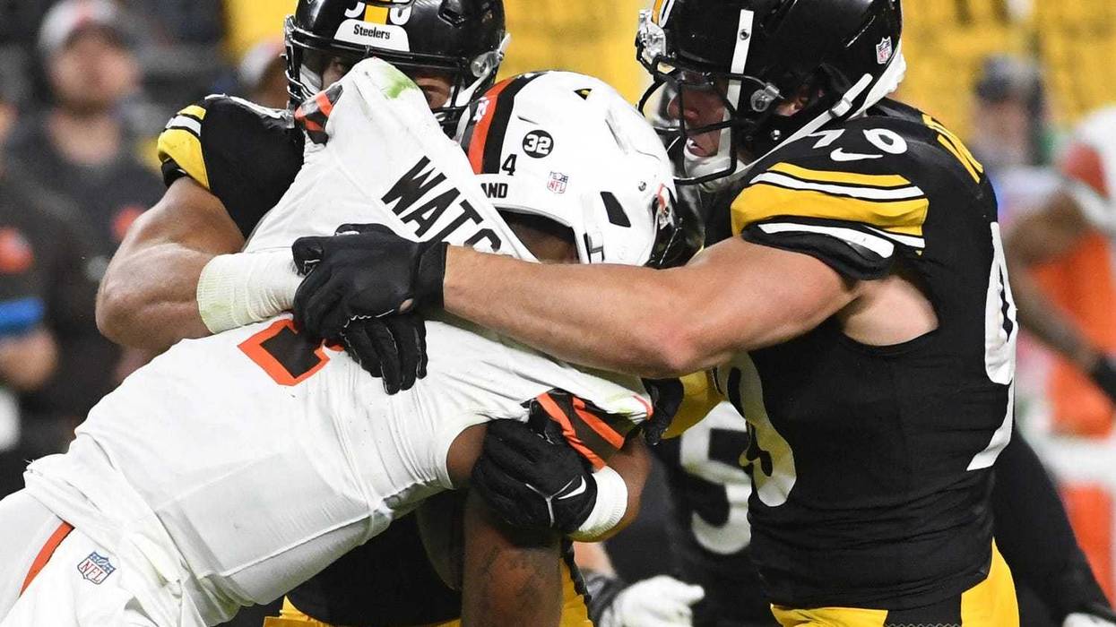 Sep 18, 2023; Pittsburgh, Pennsylvania, USA; Cleveland Browns quarterback Deshaun Watson (4) is tackled by Pittsburgh Steelers linebackers Alex Highsmith (56) and T.J. Watt (90) during the second quarter at Acrisure Stadium. Mandatory Credit: Philip G. Pavely-USA TODAY Sports