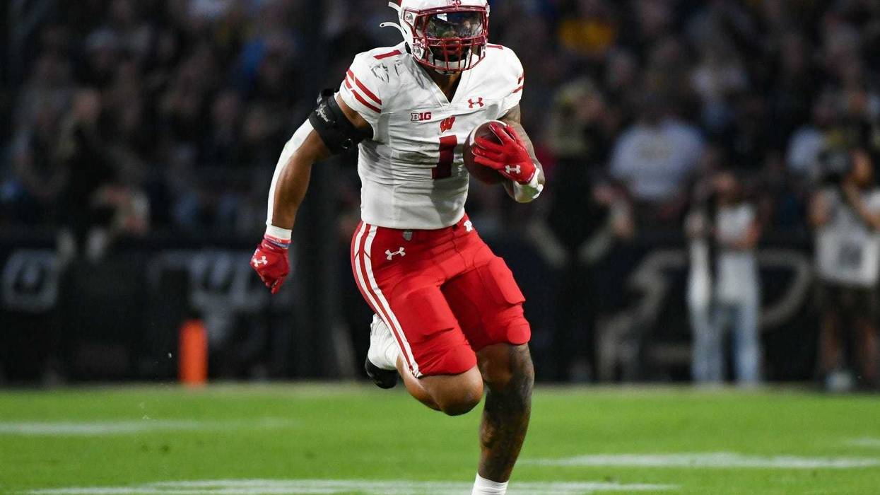Sep 22, 2023; West Lafayette, Indiana, USA; Wisconsin Badgers running back Chez Mellusi (1) runs the ball during the first half at Ross-Ade Stadium. Mandatory Credit: Robert Goddin-USA TODAY Sports