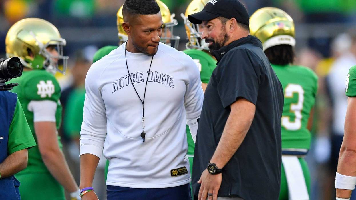 Sep 23, 2023; South Bend, Indiana, USA; Notre Dame Fighting Irish head coach Marcus Freeman and Ohio State Buckeyes head coach Ryan Day chat before the game at Notre Dame Stadium.