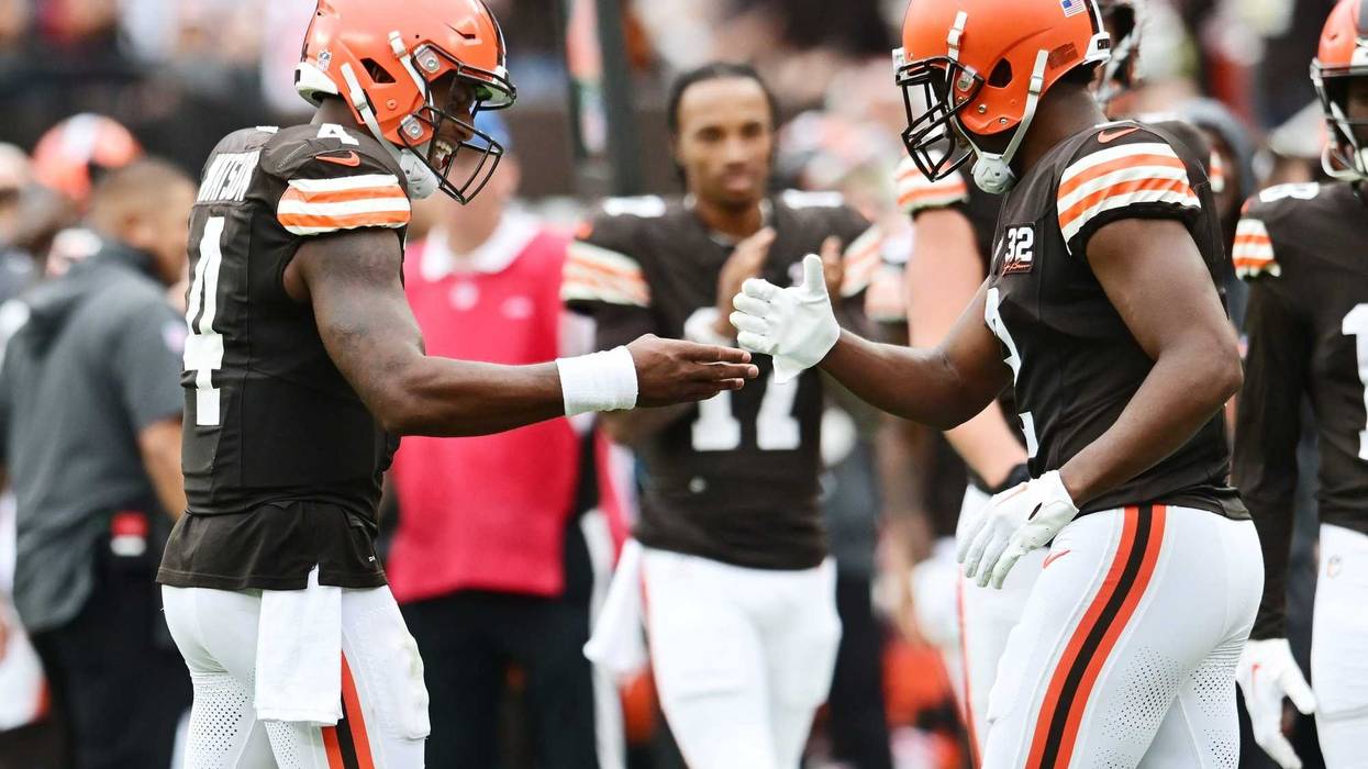 Sep 24, 2023; Cleveland, Ohio, USA; Cleveland Browns quarterback Deshaun Watson (4) celebrates with wide receiver Amari Cooper (2) after they connected on a touchdown pass during the second half against the Tennessee Titans at Cleveland Browns Stadium.