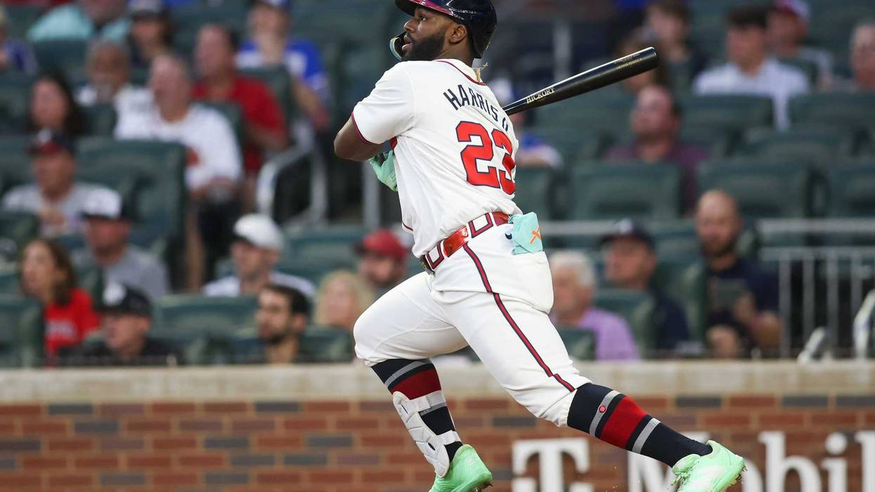 Sep 24, 2024; Atlanta, Georgia, USA; Atlanta Braves center fielder Michael Harris II (23) hits a single against the New York Mets in the first inning at Truist Park. Mandatory Credit: Brett Davis-Imagn Images