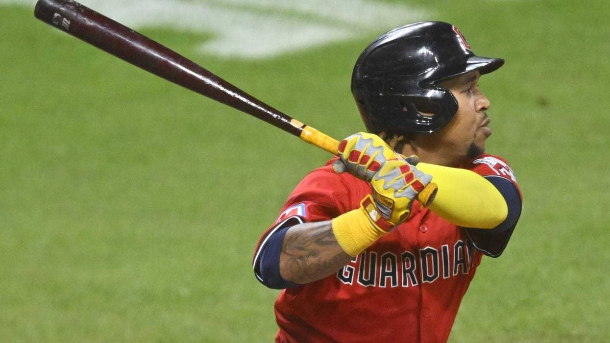 Sep 24, 2025; Cleveland, Ohio, USA; Cleveland Guardians third baseman Jose Ramirez (11) hits an RBI double in the seventh inning against the Detroit Tigers at Progressive Field.