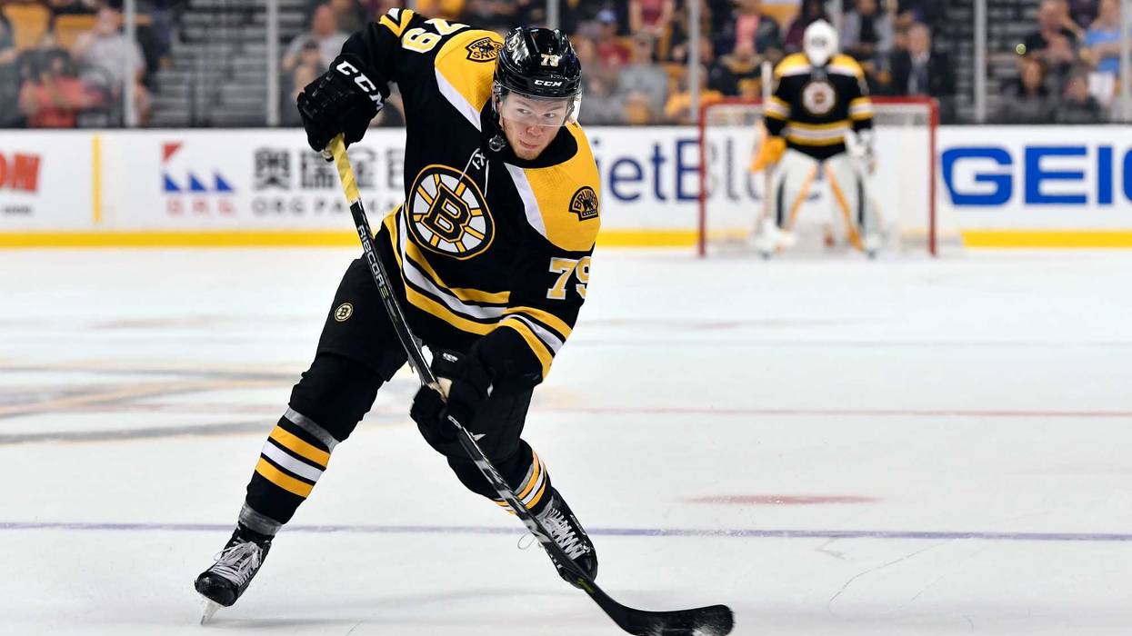 Sep 25, 2017; Boston, MA, USA; Boston Bruins defenseman Jeremy Lauzon (79) shoots the puck against the Chicago Blackhawks during the first period at the TD Garden. Mandatory Credit: Brian Fluharty-USA TODAY Sports