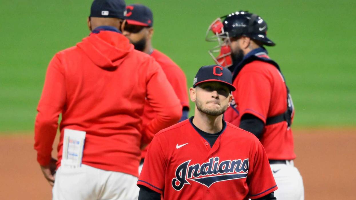Sep 29, 2020; Cleveland, Ohio, USA; Cleveland Indians relief pitcher Cameron Hill (27) walks off the mound during a pitching change in the ninth inning against the New York Yankees at Progressive Field.