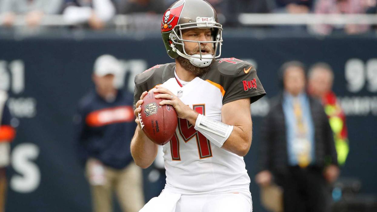 Sep 30, 2018; Chicago, IL, USA; Tampa Bay Buccaneers quarterback Ryan Fitzpatrick (14) looks to pass the ball against the Chicago Bears during the first half at Soldier Field. Mandatory Credit: Kamil Krzaczynski-USA TODAY Sports