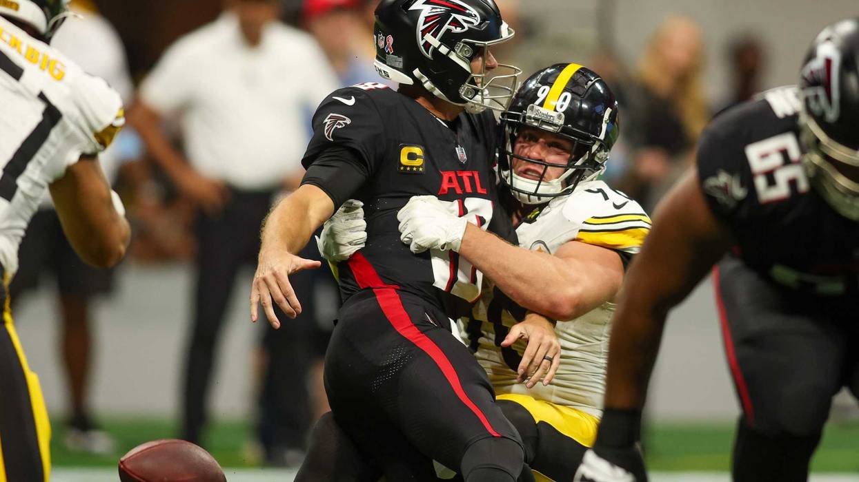 Sep 8, 2024; Atlanta, Georgia, USA; Pittsburgh Steelers linebacker T.J. Watt (90) tackles Atlanta Falcons quarterback Kirk Cousins (18) in the third quarter at Mercedes-Benz Stadium. Mandatory Credit: Brett Davis-Imagn Images