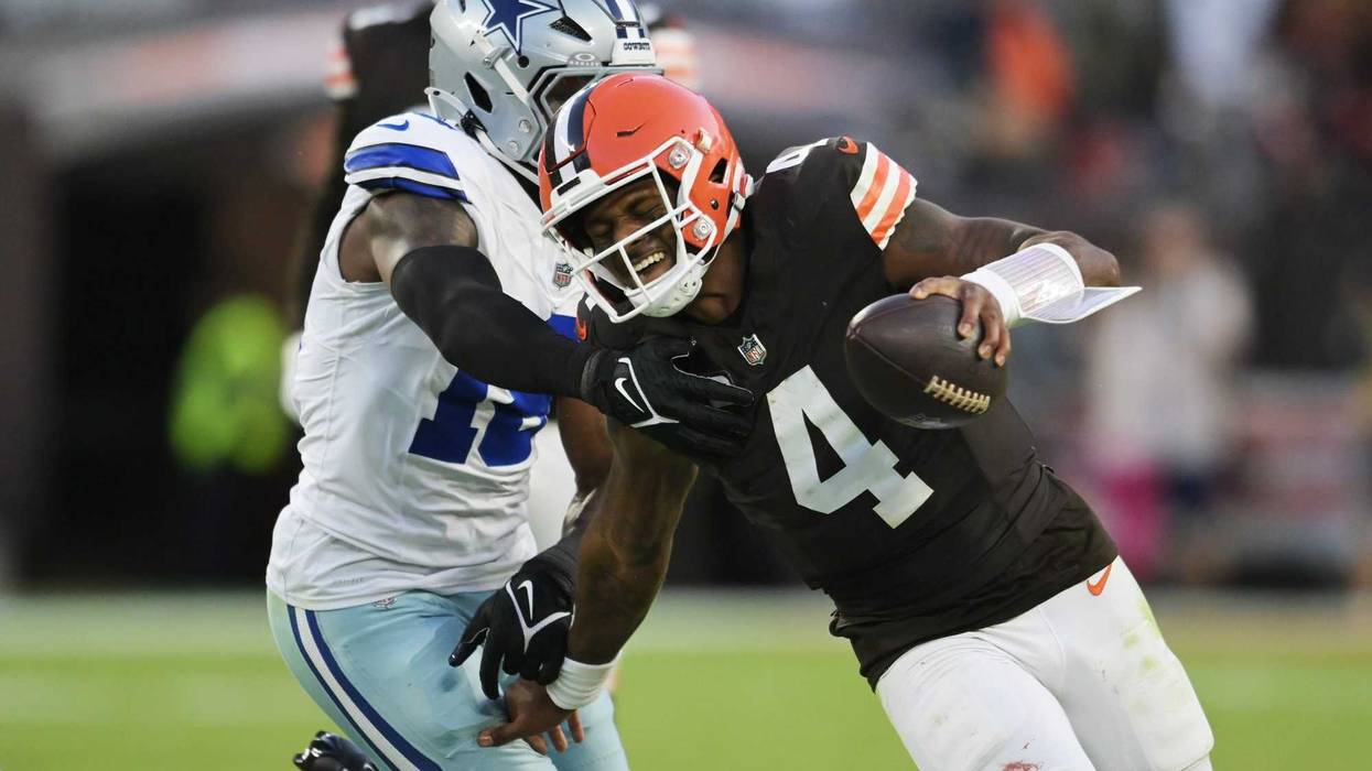 Sep 8, 2024; Cleveland, Ohio, USA; Dallas Cowboys linebacker Damone Clark (18) chases Cleveland Browns quarterback Deshaun Watson (4) during the second half at Huntington Bank Field.