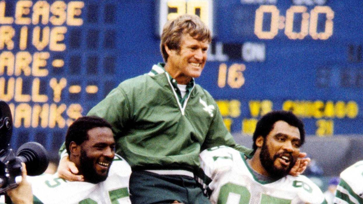 Sept. 14, 1980; Bloomington, MN, USA; FILE PHOTO; Philadelphia Eagles head coach Dick Vermeil is hoisted by defensive end Claude Humphrey (87) and defensive tackle Charlie Johnson (65) after defeating the Minnesota Vikings at Metropolitan Stadium.