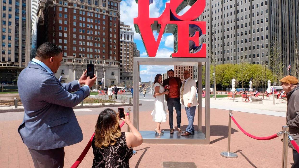 Seranthony Felix and Minerva Vargas prepare for their wedding ceremony .