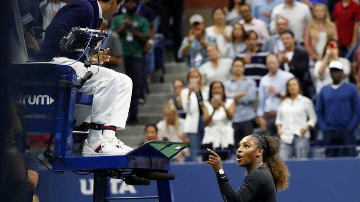 Serena Williams gestures to umpire Carlos Ramos instead of shaking hands after her match against Naomi Osaka in the U.S. Open women's final on Sept. 8, 2018, at the USTA Billie Jean King National Tennis Center.