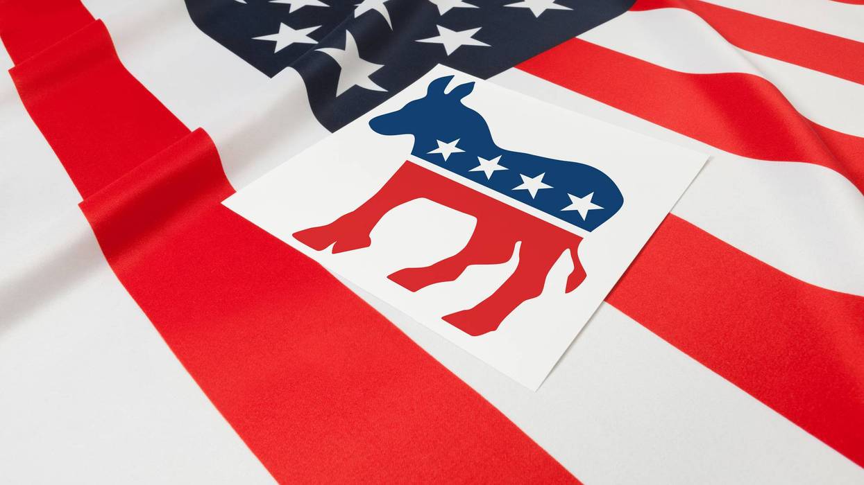 Series of USA ruffled flags with democratic party symbol over it