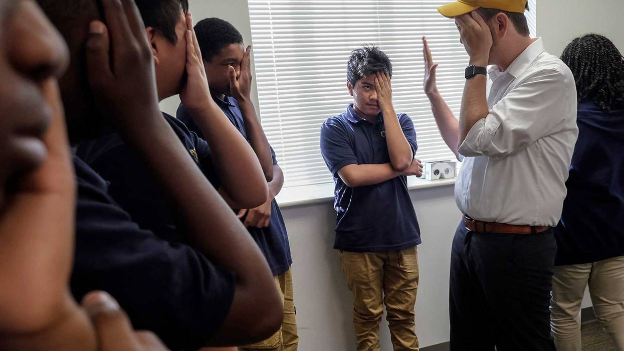 Seth Andrew, right, at a charter school in Washington, DC, on September 8, 2016.
