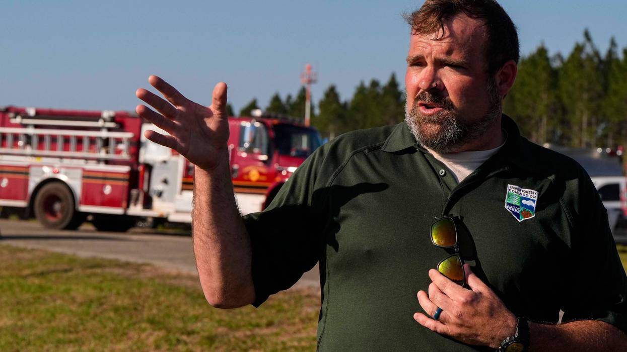 Southern US wildfires force residents to flee, leaving them unsure if their homes are standing