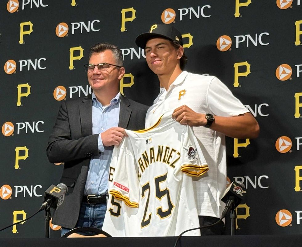 Seth Hernandez with Ben Cherington with jersey