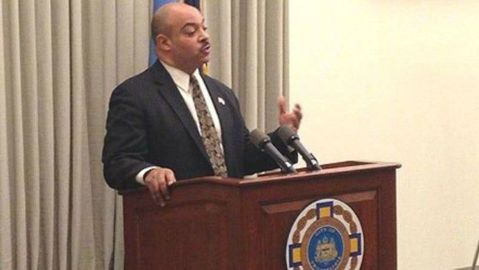 Seth Williams in 2014 at a podium