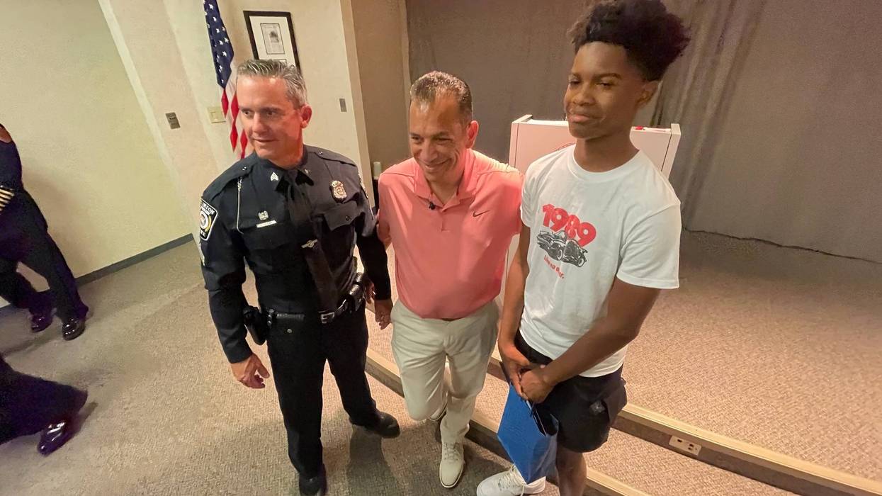 Sgt. Paul Collins (left), Ed Fortuna (center) and Richard Blackwell (right)