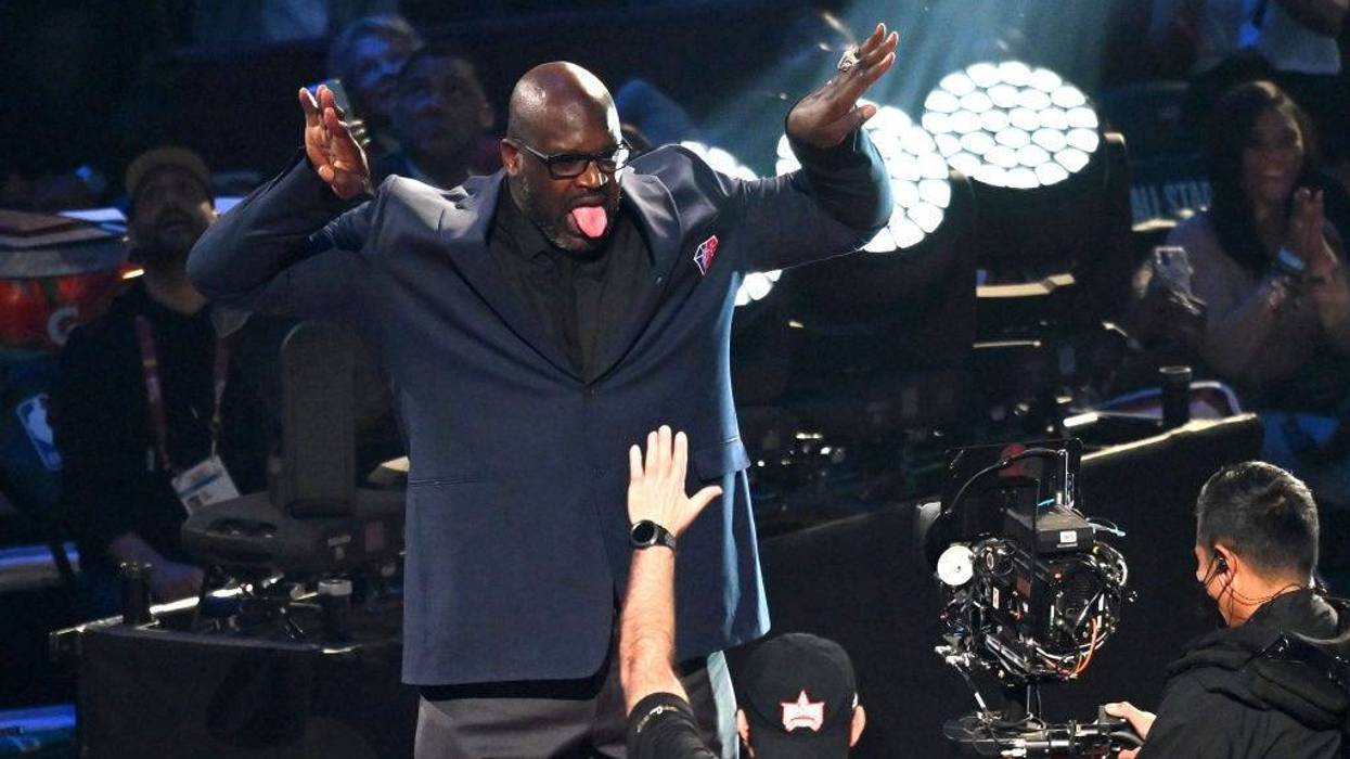 Shaquille O'Neal reacts after being introduced as part of the NBA 75th Anniversary Team during the 2022 NBA All-Star Game.