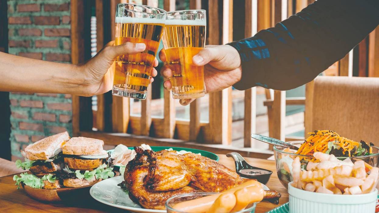 Sharing a beer at Thanksgiving with friends.