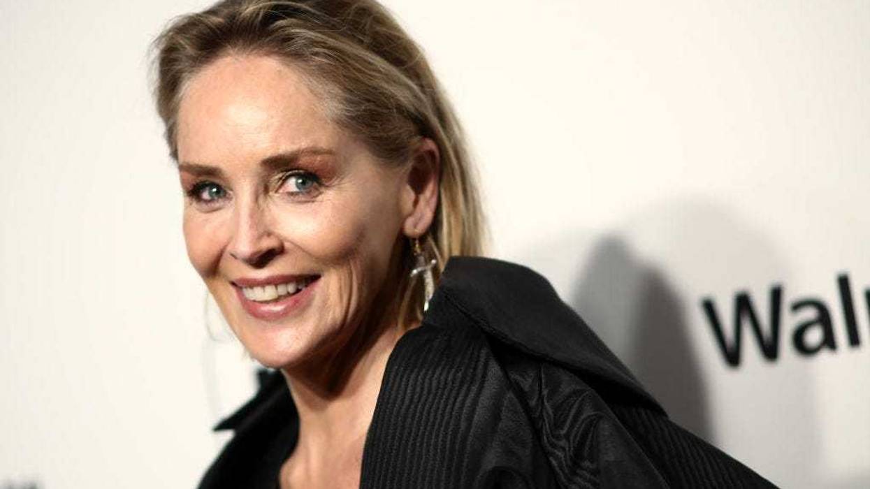 Sharon Stone walks the red carpet at the Elton John AIDS Foundation Academy Awards Viewing Party