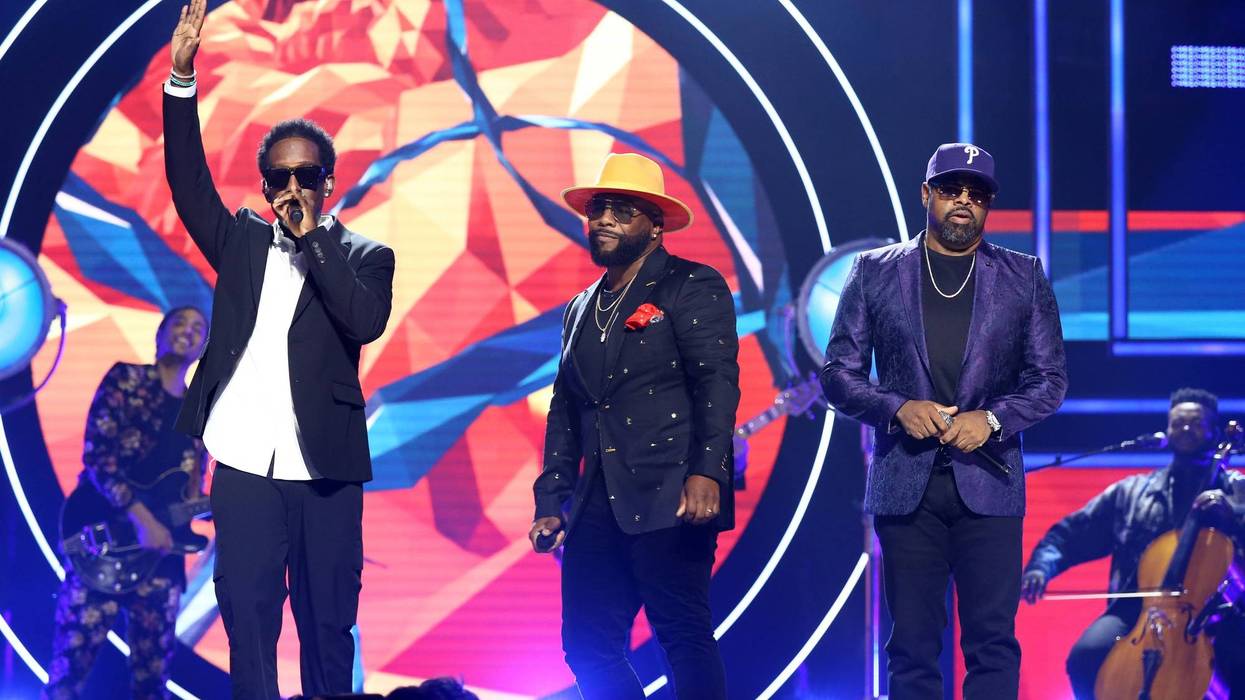 Shawn Stockman, Wanya Morris and Nathan Morris of Boyz II Men perform onstage during 2021 CMT Artist of the Year at Schermerhorn Symphony Center on October 13, 2021 in Nashville, Tennessee.