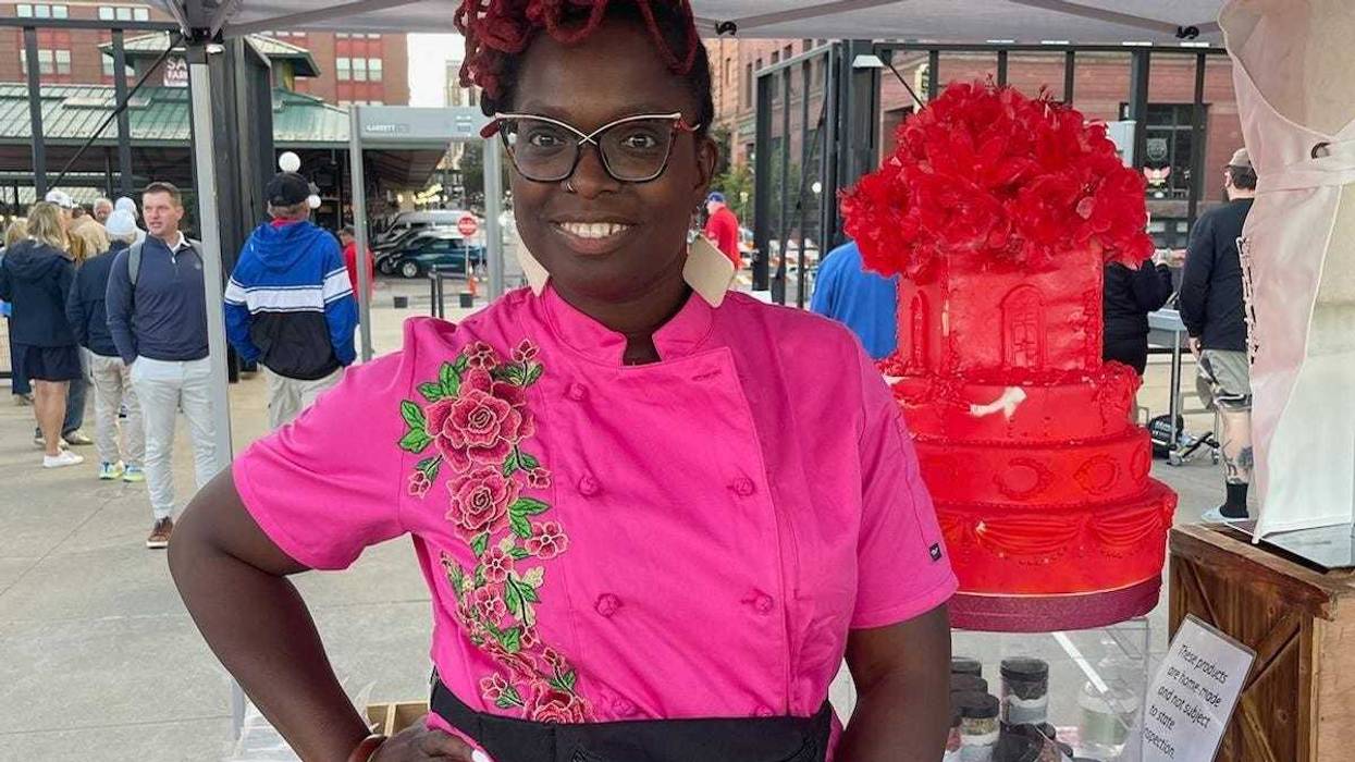 Sheletta Brundidge throws out first pitch at St Paul Saints game to mark Black Business Night at the Ballpark