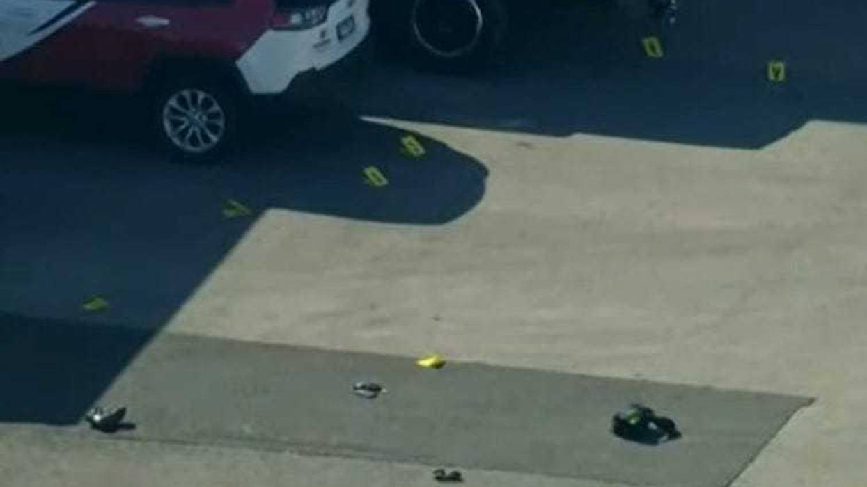 shell casings and markers at crime scene