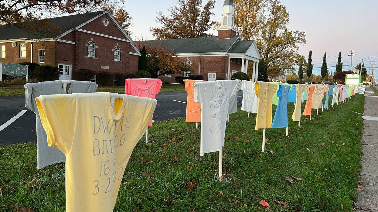 Shirts representing lives lost to gun violence stretch along the lawn of Tree of Life Church in Springfield, Pa.