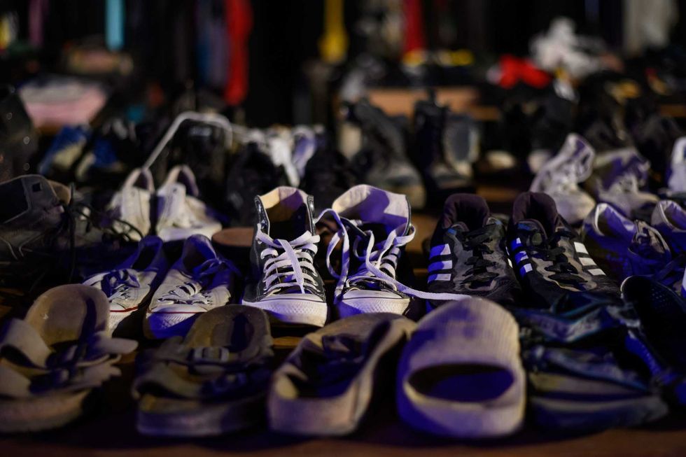 Shoes recovered from victims are seen at the