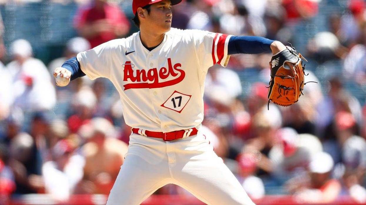 Shohei Ohtani #17 of the Los Angeles Angels throws against the Cincinnati Reds in the second inning during game one of a doubleheader at Angel Stadium of Anaheim on August 23, 2023 in Anaheim, California.