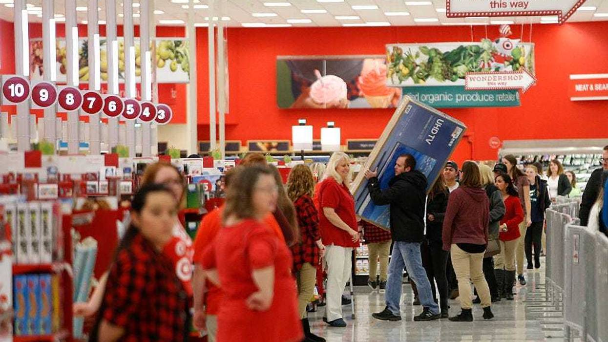 Shoppers check out with "Black Friday" deals at a Target on November 24, 2016 in Orem, Utah.