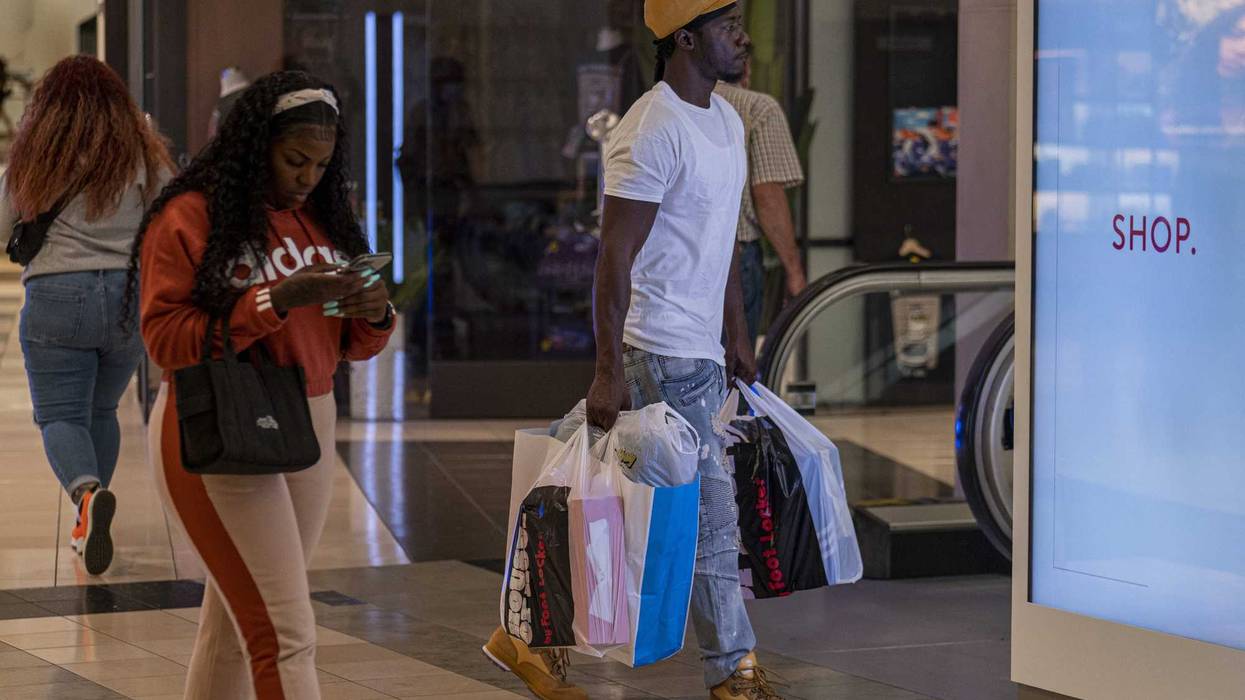 Shoppers walk inside the Westfield San Francisco Centre shopping mall in San Francisco, California, U.S. on Tuesday, June 15, 2021. California lifted most of its Covid-19 restrictions Tuesday as part of a grand reopening in which the state will end capacity limits, physical distancing and mask requirements for those that are vaccinated.