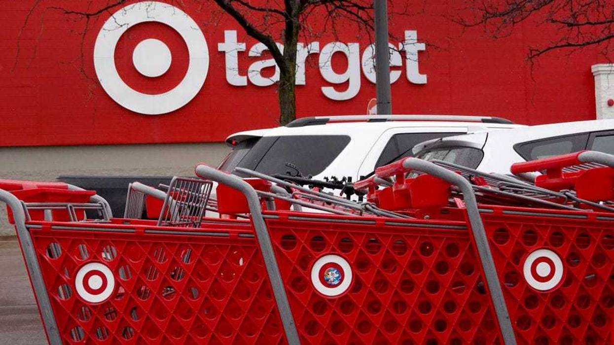 Shopping carts are lined up outside of a Target store on November 16, 2022 in Chicago, Illinois. Target’s stock plummeted today after the company reported a 52% drop in profits during the third quarter. (Photo by Scott Olson/Getty Images)