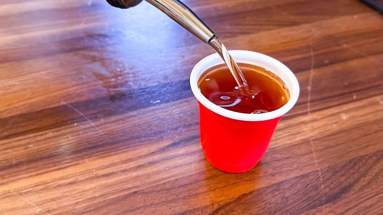 Shot being poured at Rel'ish Burger Lounge