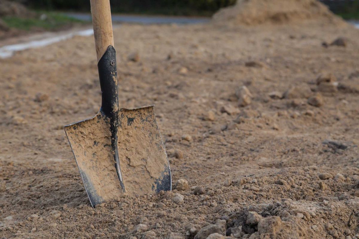 Shovel in dirt.