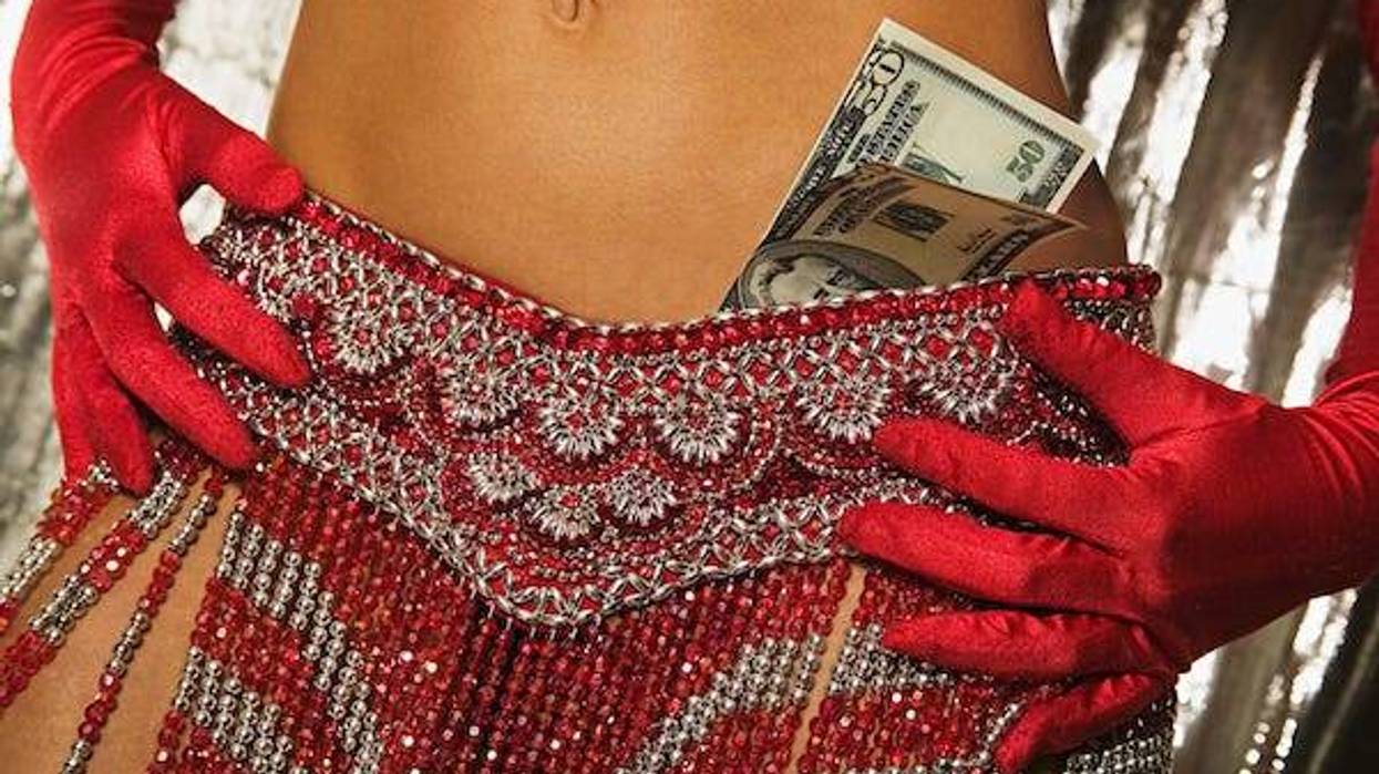 Showgirl with money in her skirt -
