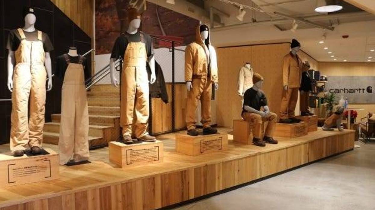Showroom display of Carhartt coats, coveralls, hats, etc.