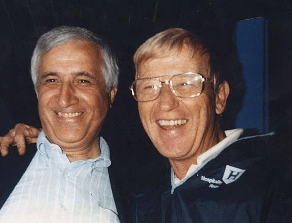 Sid with Lou Holtz