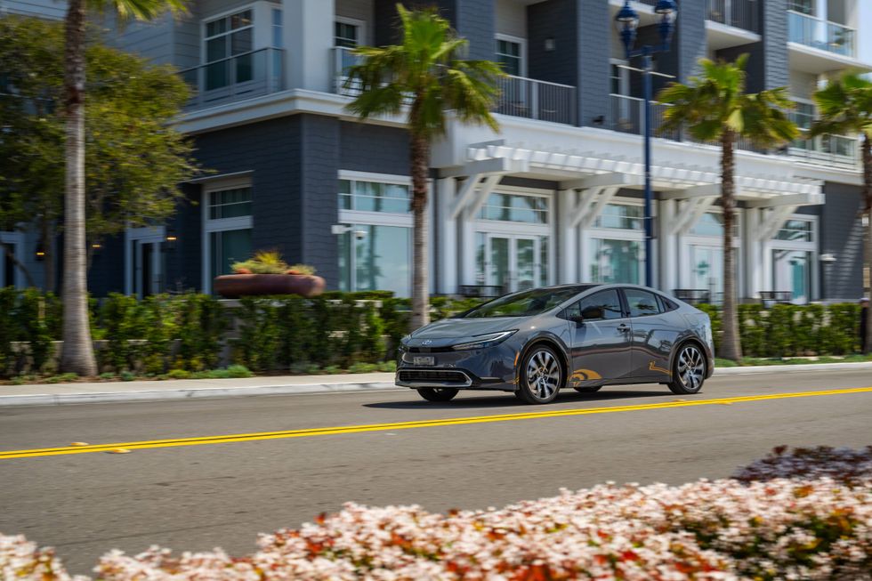 Side view of the 2023 Toyota Prius Prime on the street